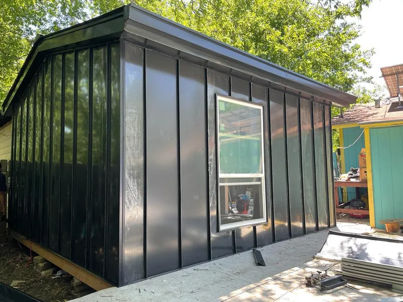 Black standing seam metal wall panels for Roof Inspection in Grosse Pointe Park