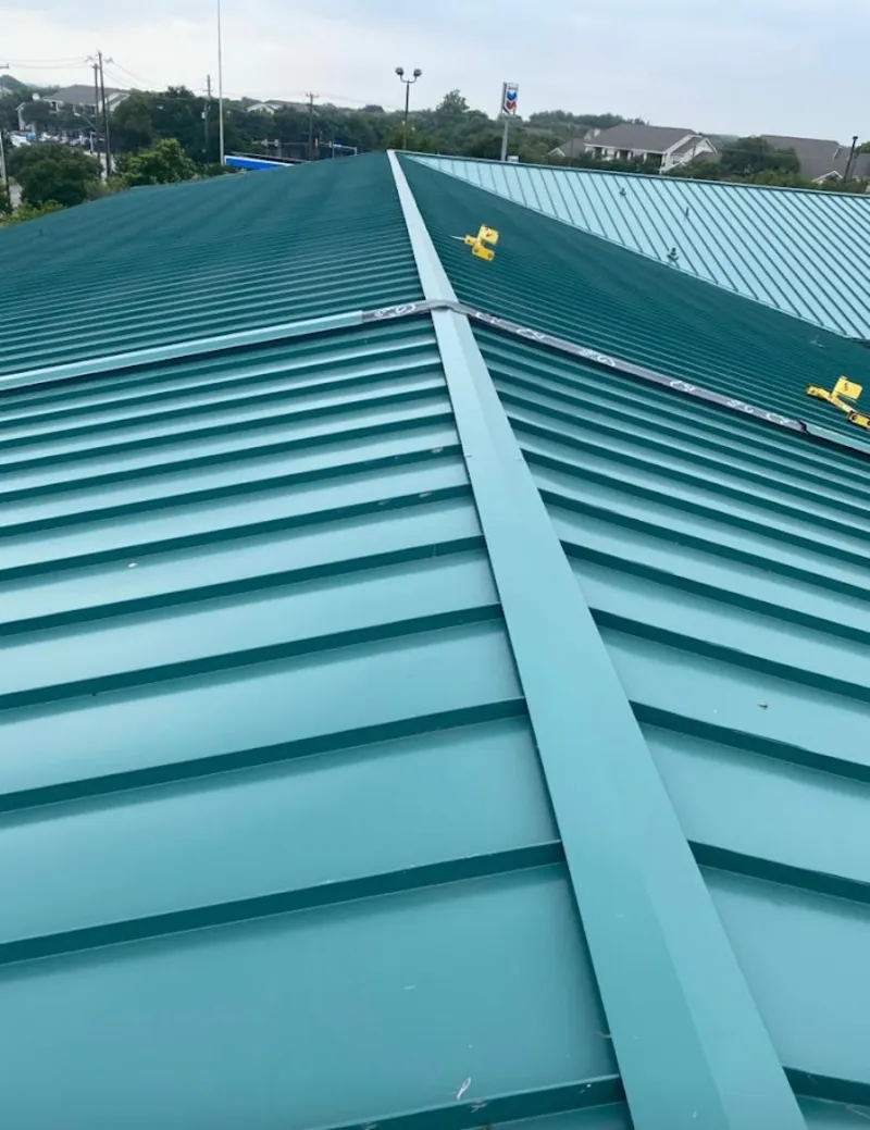 Green commercial metal roof ridge and valley for Metal Roof Repair in Grosse Pointe Park